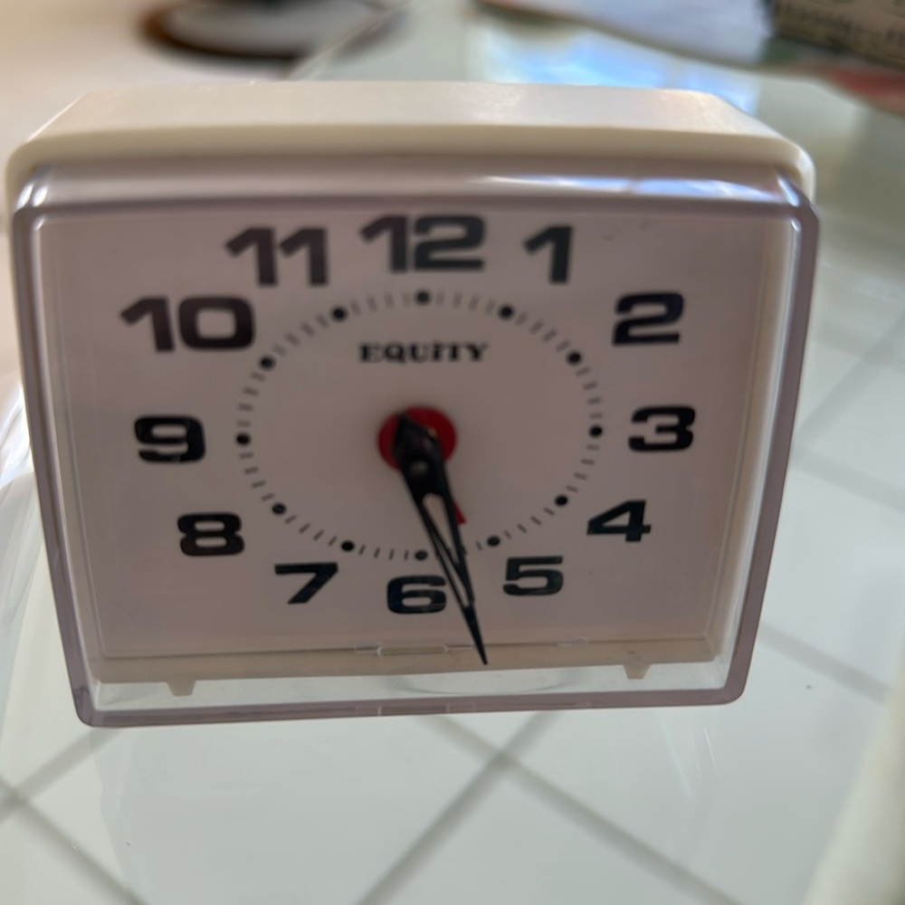 Vintage little wind up alarm clock.